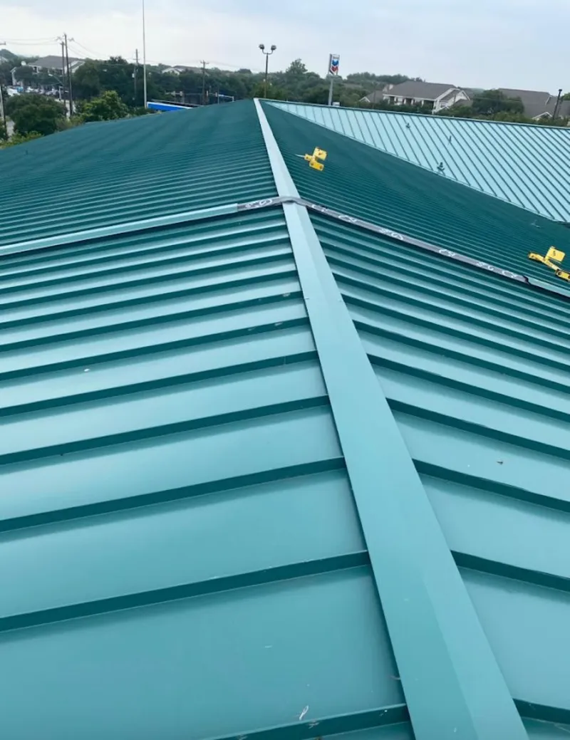 Green commercial metal roof ridge and valley for Metal Roof Repair in Hanson
